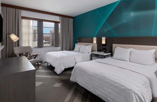 Downtown Houston Hotel | Indulge in Comfort & Style! 4 Spacious Units for Groups, Pets Allowed!