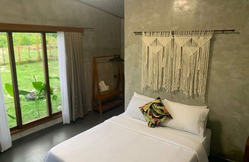 El Nido Cabina | The Grove Nacpan