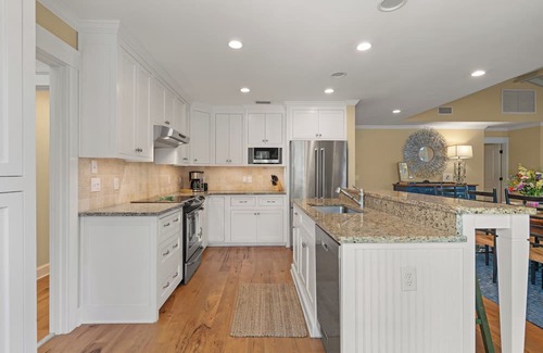 East Beach Casa | The Blue Door Cottage sleeps 8 and makes for a perfect beach getaway