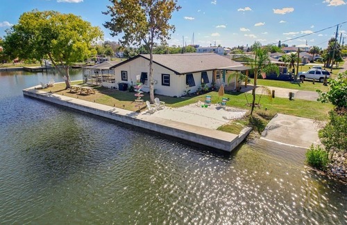 Sea Ranch Casa | "Stay Salty" Florida Pool/Canal Home, 4 bed, 3.5 bath, bring boat!