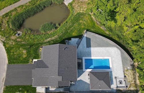 Newtonville Casa | Modern Spacious 6-Bedroom Home with Heated Pool and Pool House 20 min from Track