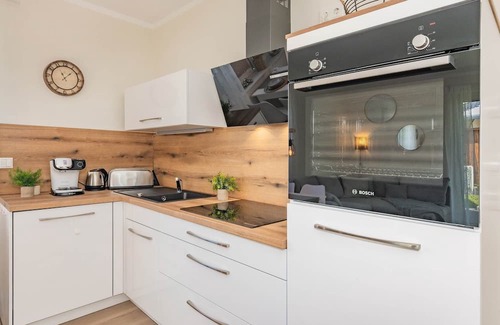 Ueckeritz Apartamento | Cozy vacation home "Domizil zum Lerchengrund 03" in Ückeritz close to the beach