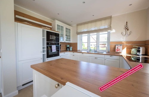 Borgsum Casa | Utblick vacation home in Borgsum: relax with a sea view and sauna