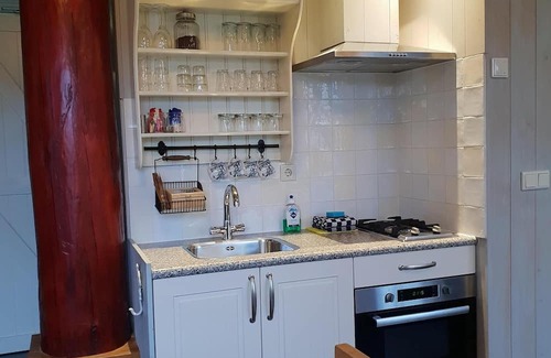 Oudeslius Casa | Have a unique experience in the Boerderijkamer with private outdoor hot tub , breathtaking views and comfortable amenities. Enjoy a carefree stay with fresh rolls and delicious coffee every day and explore the surrounding area, the beach, Callantsoog