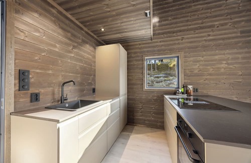 Kviteseid Casa | This house has a beautiful and unique location on the edge of Lake Vråvatn and gives you the feeling of 'coming home'.