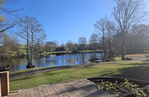 Olive Branch Casa | Grand 8-Bedroom Brick Southern Home with Lakeview Backyard.