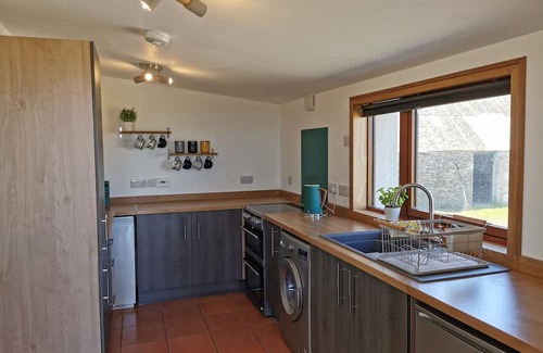 Canisbay Cabaña | Cosy Highland retreat with countryside and sea views.