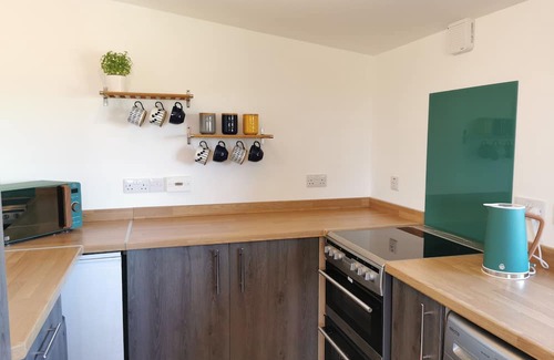 Canisbay Cabaña | Cosy Highland retreat with countryside and sea views.