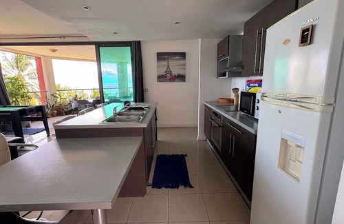 Punaauia Apartamento | Condo in Punaauia "Vue Moorea + Piscine" opposite the Anita caravan