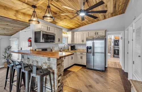 Beach Haven West Casa | Stunning 3-bedroom Lagoon-Front Oasis- Serenity Awaits!