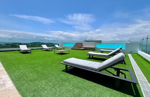 Playas Condominio | Departamento de lujo con vista infinita al mar.