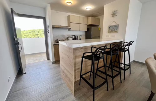 Playas Condominio | Departamento de lujo con vista infinita al mar.
