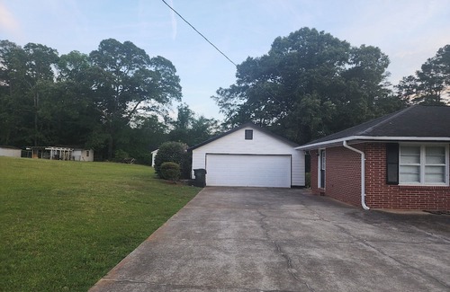 Covington Casa | Charming brick ranch on 1.28 acres near downtown Covington, GA,
