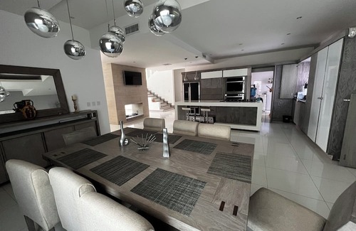 Delicias Casa | Spacious 4-bedroom house with WiFi, Pool, fitness room in welcoming Delicias