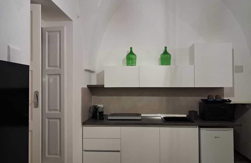 Capitolo Casa | The White Apple