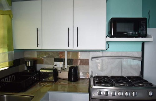 Corinthe Apartamento | Cherie Daze Villa- Charming 1-bedroom apartment.
