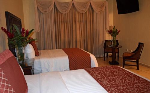 San Pedro Sula Hotel | La Casa de los Arcos Hotel Boutique