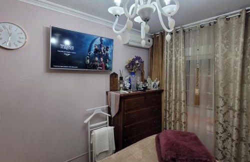 Distrito Sur Casa | Shared accommodation a room with a view of the garden