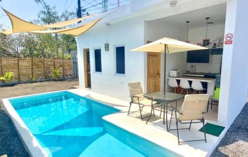Monterrico Apartamento | Ola Azul, apartamento de playa con cocina y piscina privada.