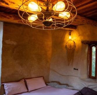 Naina Range Cama Y Desayuno | Hidden Earthen Home With An SUV Car As Entrance