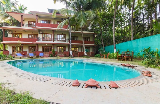 Outdoor Pool with Classic Bedroom in Goa