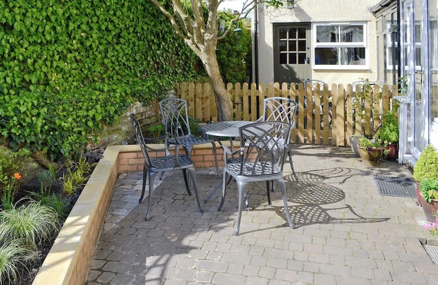 Tucked within a peaceful courtyard of four yet only a few yards from the River Coquet in Warkworth.
