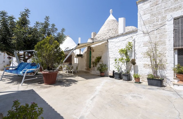 Casa de vacaciones 'Trullo Antica Pietra' con terraza privada, jardín privado y aire acondicionado