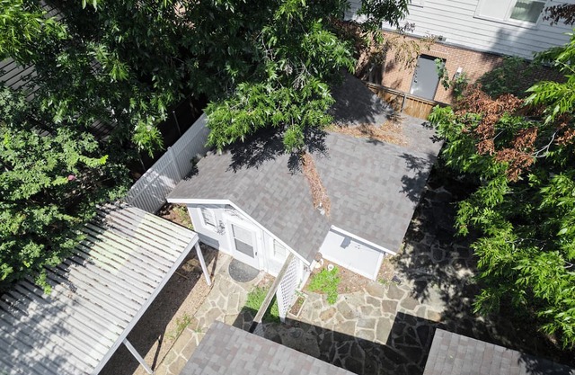 Charming Modern 4BR Home - Lux - Backyard.