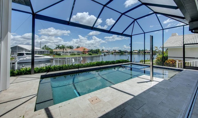 Punta Gorda Casa | NEW Luxury Executive Waterfront Home in Punta Gorda Isles! Dock, Pool/Spa, Beach Essentials, Bikes