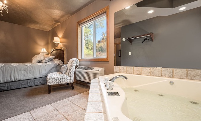 Farmington Casa | JV Thompson | Jacuzzi Tub Historic Inn Room