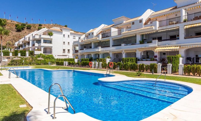 Rincón de la Victoria Apartamento | Comfortable, attractively located vacation home with shared pool and panoramic sea views.