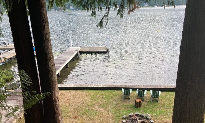 Lake Cavanaugh Cabina | Charming Waterfront Mid Century Waterfront Cabin w/ Hot Tub + Breathtaking Views