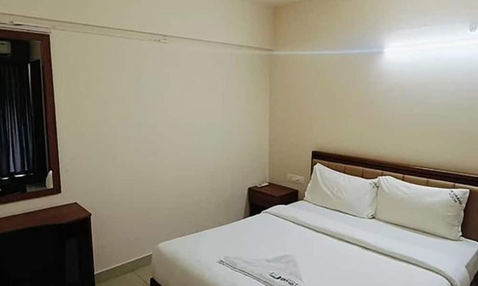 Kaloor Hotel | Fabhotel Jk Grand