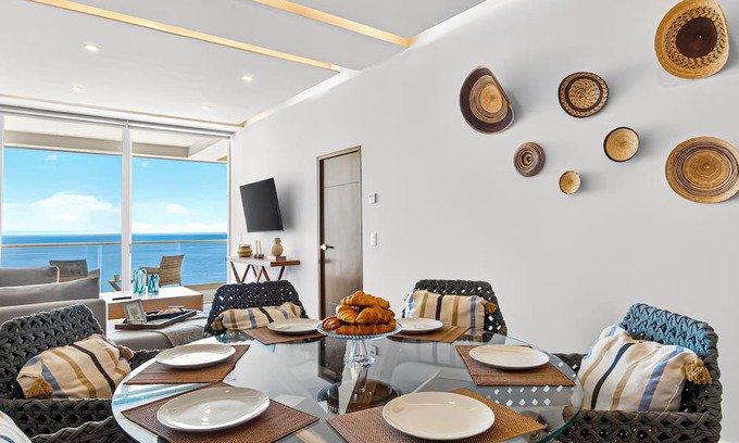 Las Glorias Apartamento | Beachfront 2BR - Pools & Balcony Views