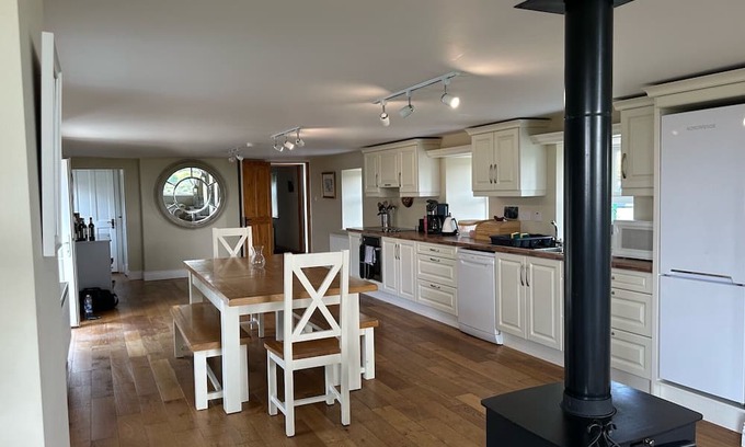 Hook Head Casa | Gorgeous renovated farmhouse with sweeping views of lush farmland!