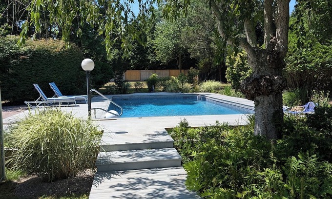 Remsenburg Casa | Charming 2-bedroom house in peaceful Remsenburg with AC, WiFi, and a Huge Pool!