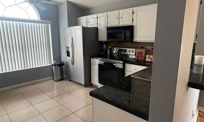 Esprit Casa | Spacious 4-bedroom house in delightful Davenport with WiFi, AC And Near Disney