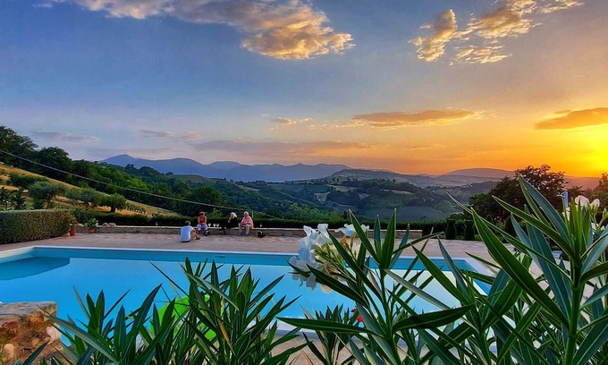 Penna San Giovanni Casa | San Isidore, a meticulously restored historic Italian home with a stunning pool.