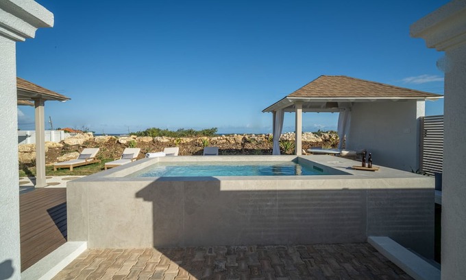 Belair Cabaña | Serene, air-conditioned two-bedroom villa with plunge pool and ocean views.