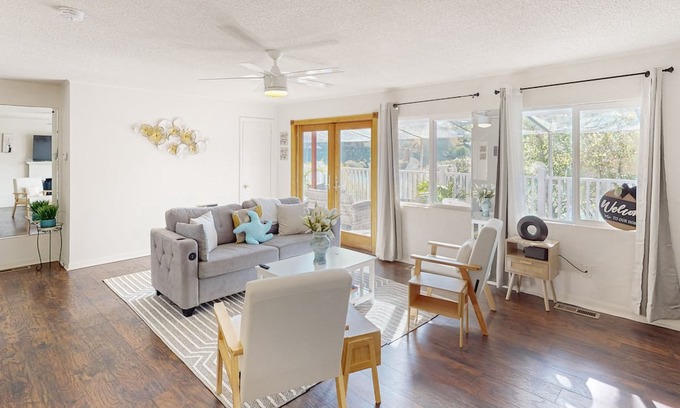 Shoreline Casa | Dog-friendly lake view getaway with a full kitchen, sunroom, fireplace