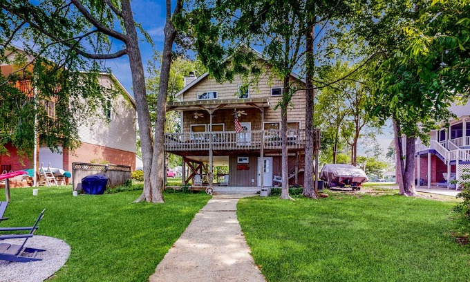 Newberry Shores Casa | Unique waterfront home with direct water access, dock, firepit, porch, W/D, AC