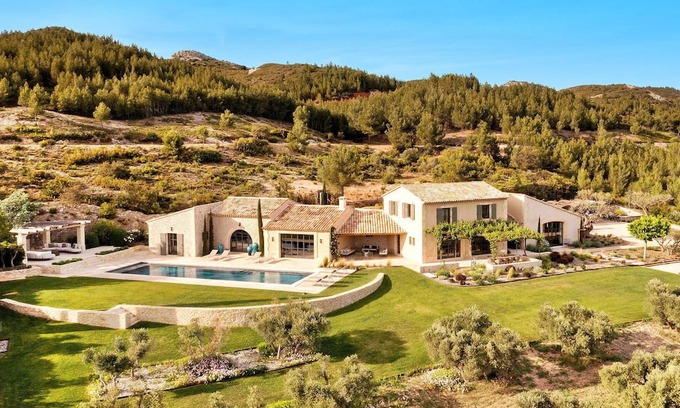 Maussane-les-Alpilles Casa | Experience the height of luxury in this air-conditioned vacation villa for up to 12 guests, nestled