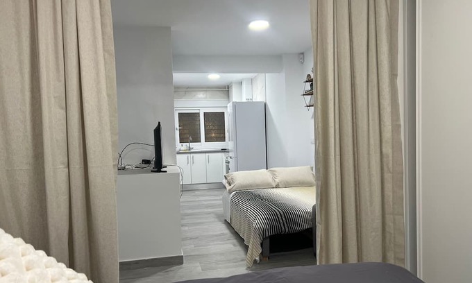 El Pilar Apartamento | Spacious Madrid Haven:Explore the Best of the City from Your Stylish RetreatTen!