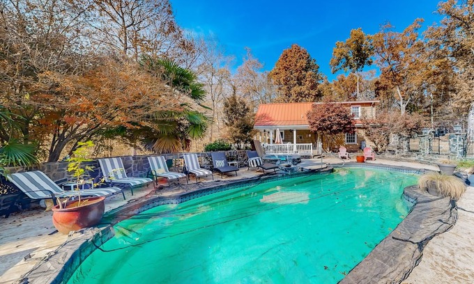 Rock Hill Cabaña | Unique and retro stay on the river with grill, hot tub, pool, & W/D access