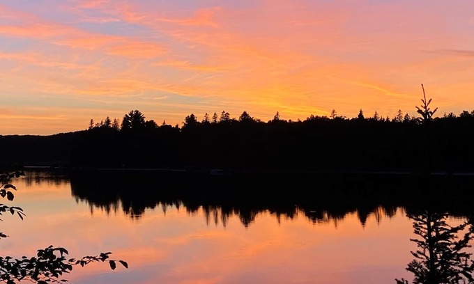 Nevis Cabina | Booking now for summer! Stunning vintage log home on pristine lake.