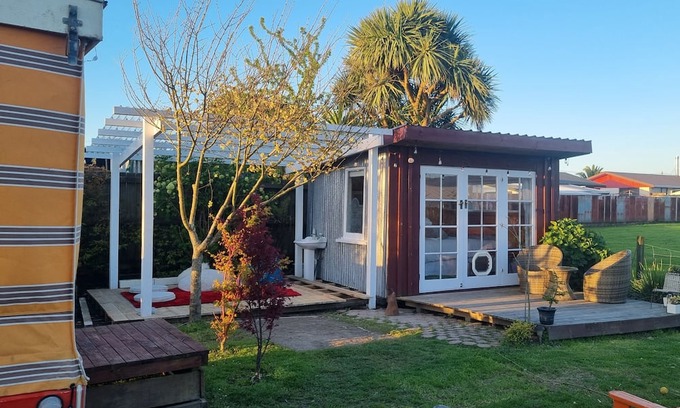 Westport Cabaña | Unique, delightful Tiny Home with Alfresco living area including retro Poptop.