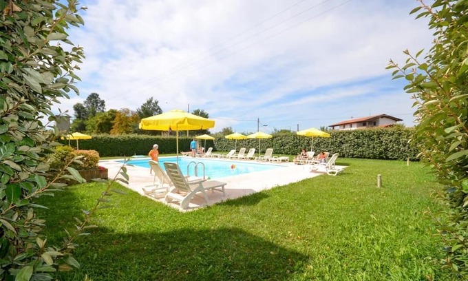 San Michele al Tagliamento Apartamento | Relaxing escape in a green oasis by Beahost Rentals