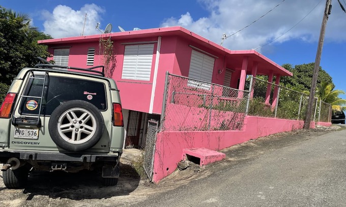 Isabel II Casa | Pink House that sits on the hill and easy access to the island’s attractions.