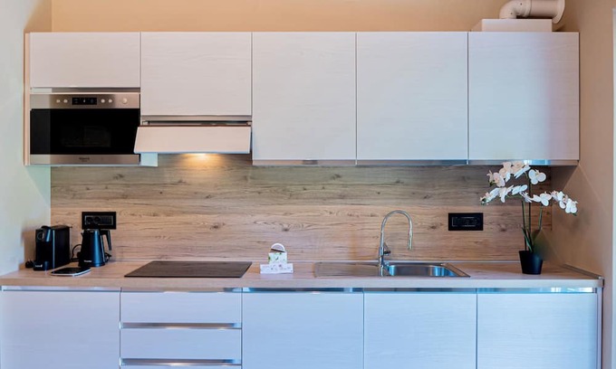 Bracchio Apartamento | BRIGHT APARTMENT SURROUNDED BY GREENERY