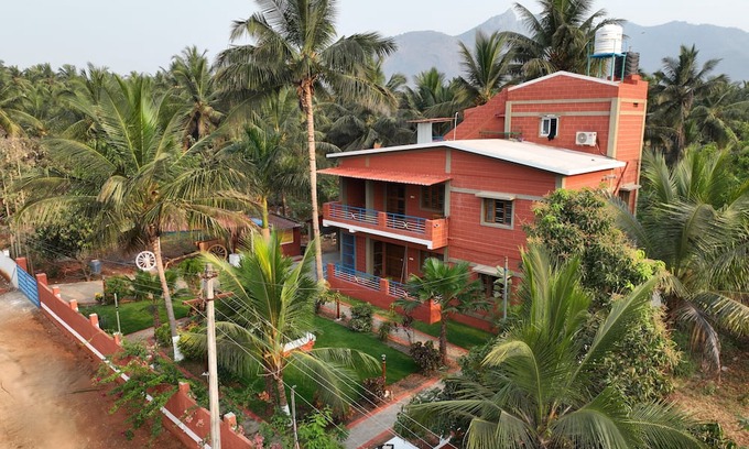 Coimbatore Otro | Charming 2-bedroom farmhouse with WiFi, AC in pristine Alanthurai, Coimbatore